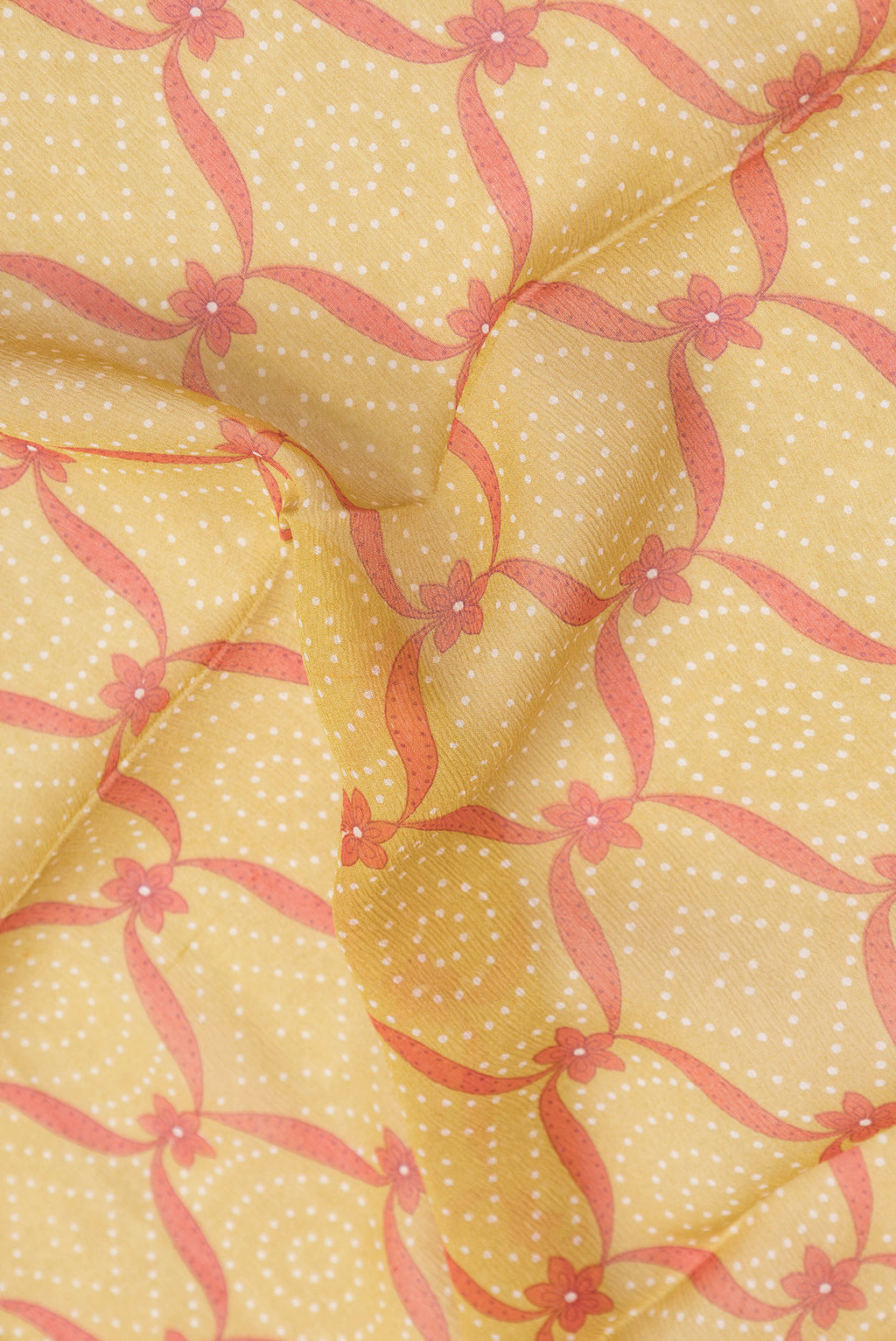 Close up of Mehandi Green Dual Tone Mysore Chiffon Saree with Printed design on the body and Plain Border.  displaying folds