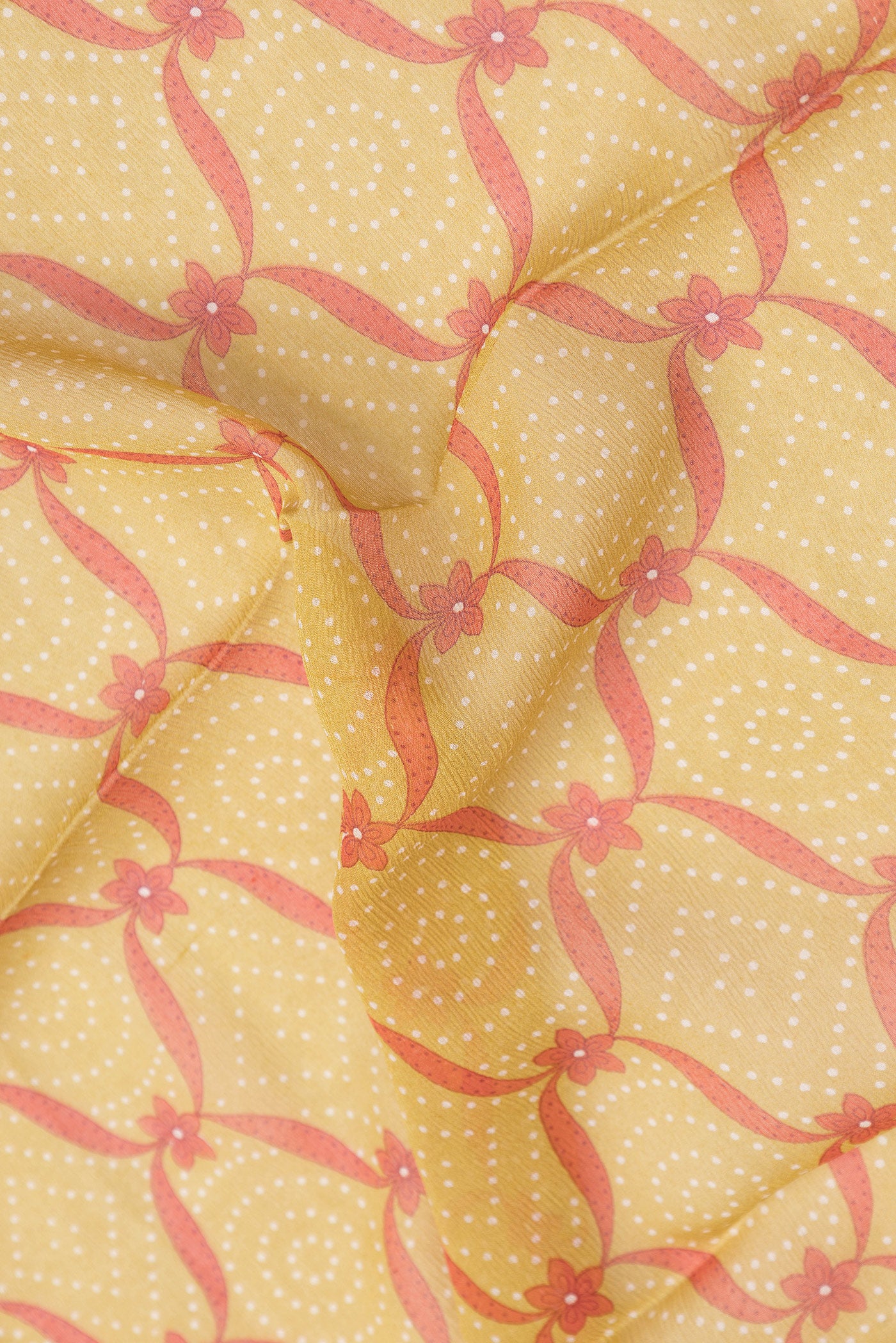 Close up of Mehandi Green Dual Tone Mysore Chiffon Saree with Printed design on the body and Plain Border.  displaying folds