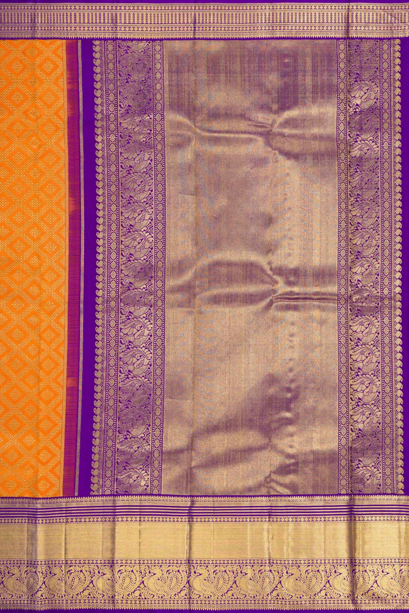 Close up image of the pallu of Pure Silk Pure Zari Orange Dual Tone Kanjivaram Saree with Zari Brocade on the body and Zari Border. 
