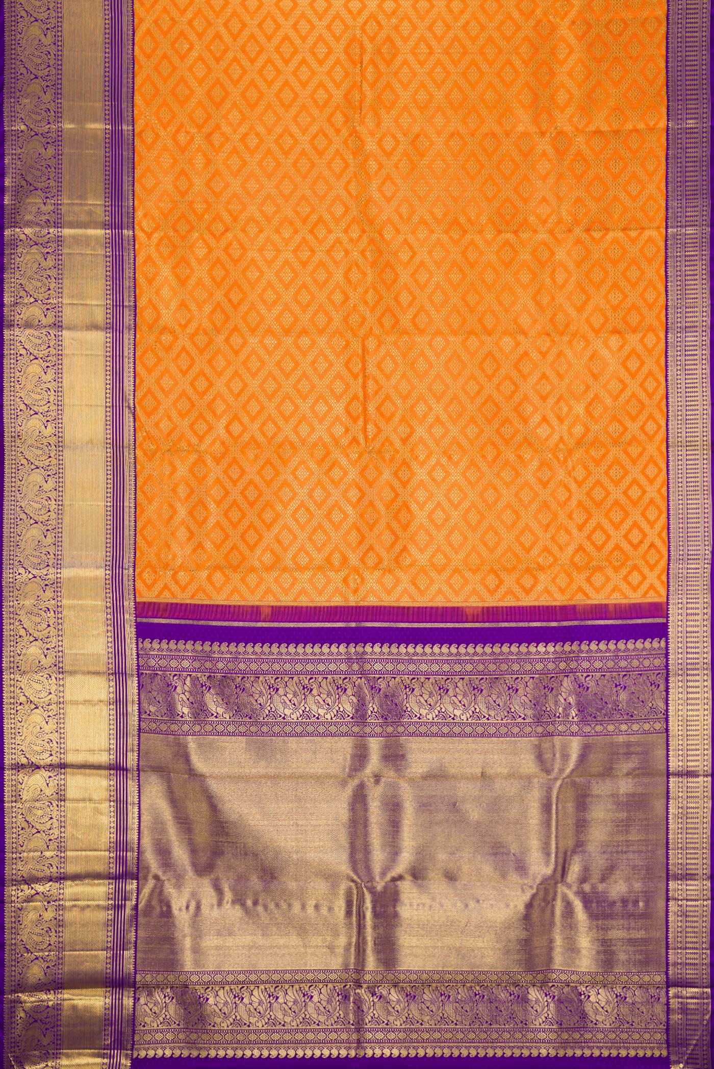 Flat view of Pure Silk Pure Zari Orange Dual Tone Kanjivaram Saree with Zari Brocade on the body and Zari Border. 