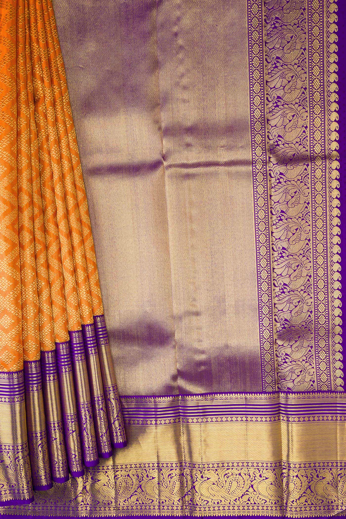 Pleats and pallu of Pure Silk Pure Zari Orange Dual Tone Kanjivaram Saree with Zari Brocade on the body and Zari Border. 
