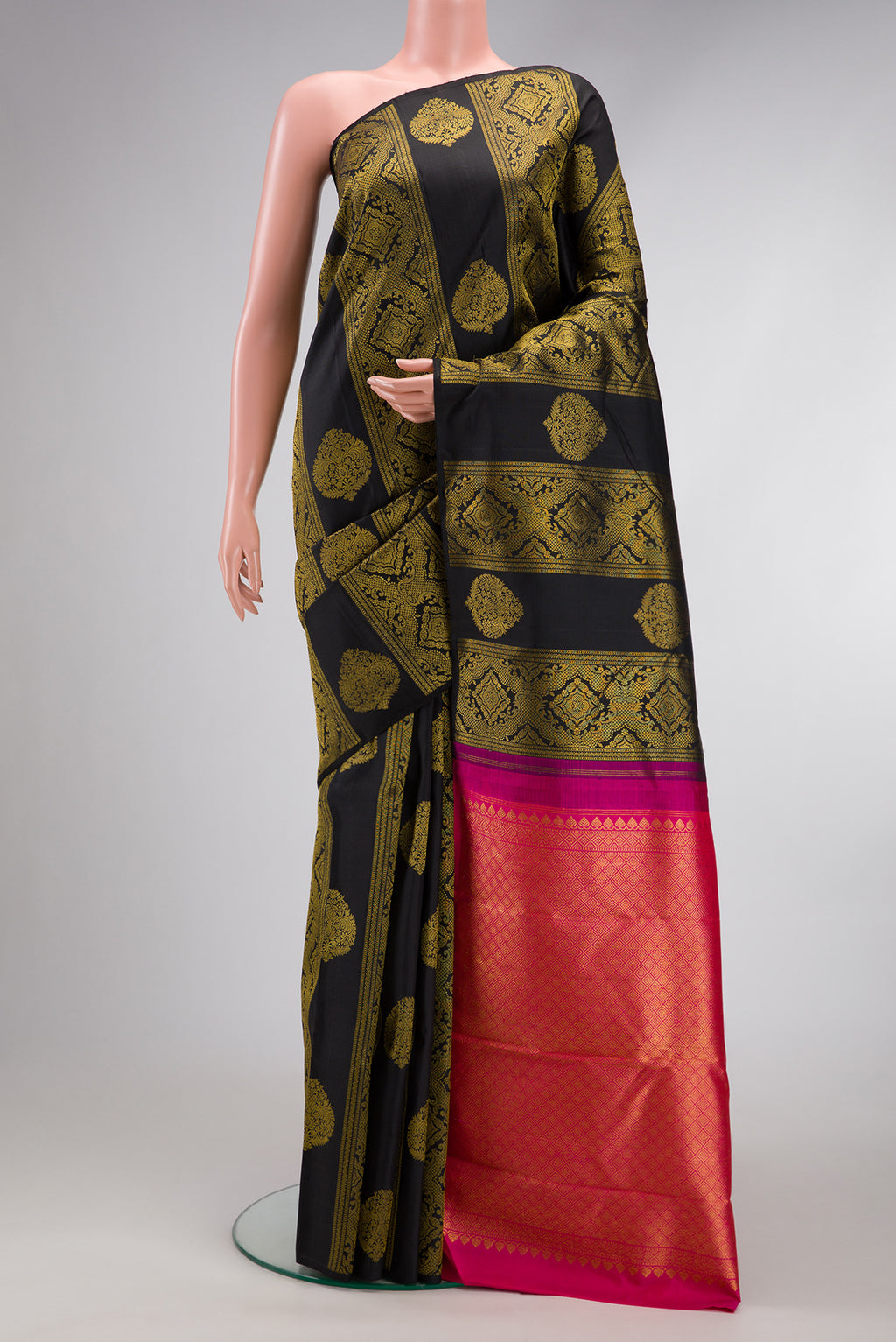 Black Dual Tone Kanjivaram Silk Saree with Zari Butta on the body and Without Border.  displayed on a mannequin
