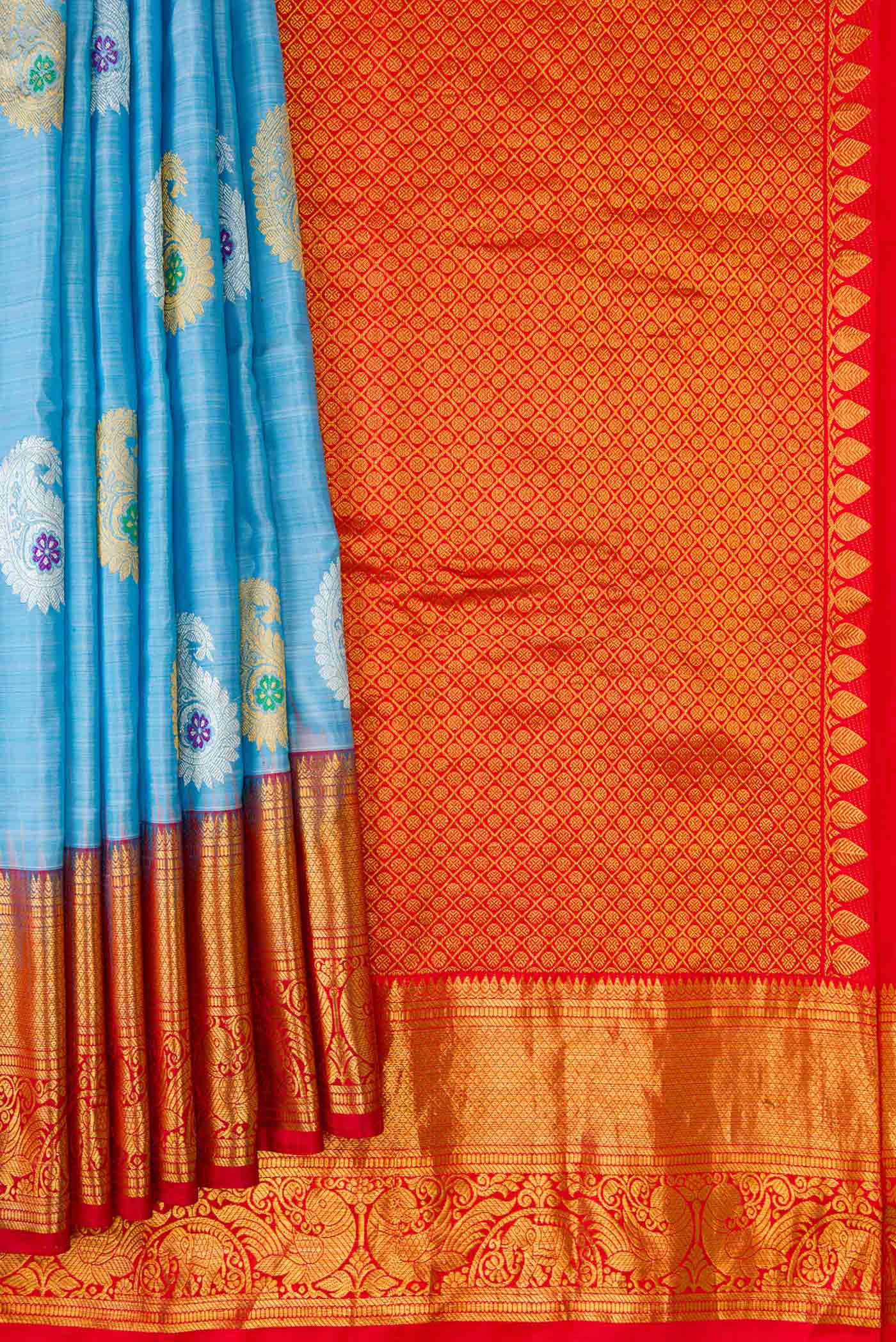 Pleats and pallu of Light Blue Dual Tone Gadwal Silk Saree with Zari Butta on the body and Zari Border