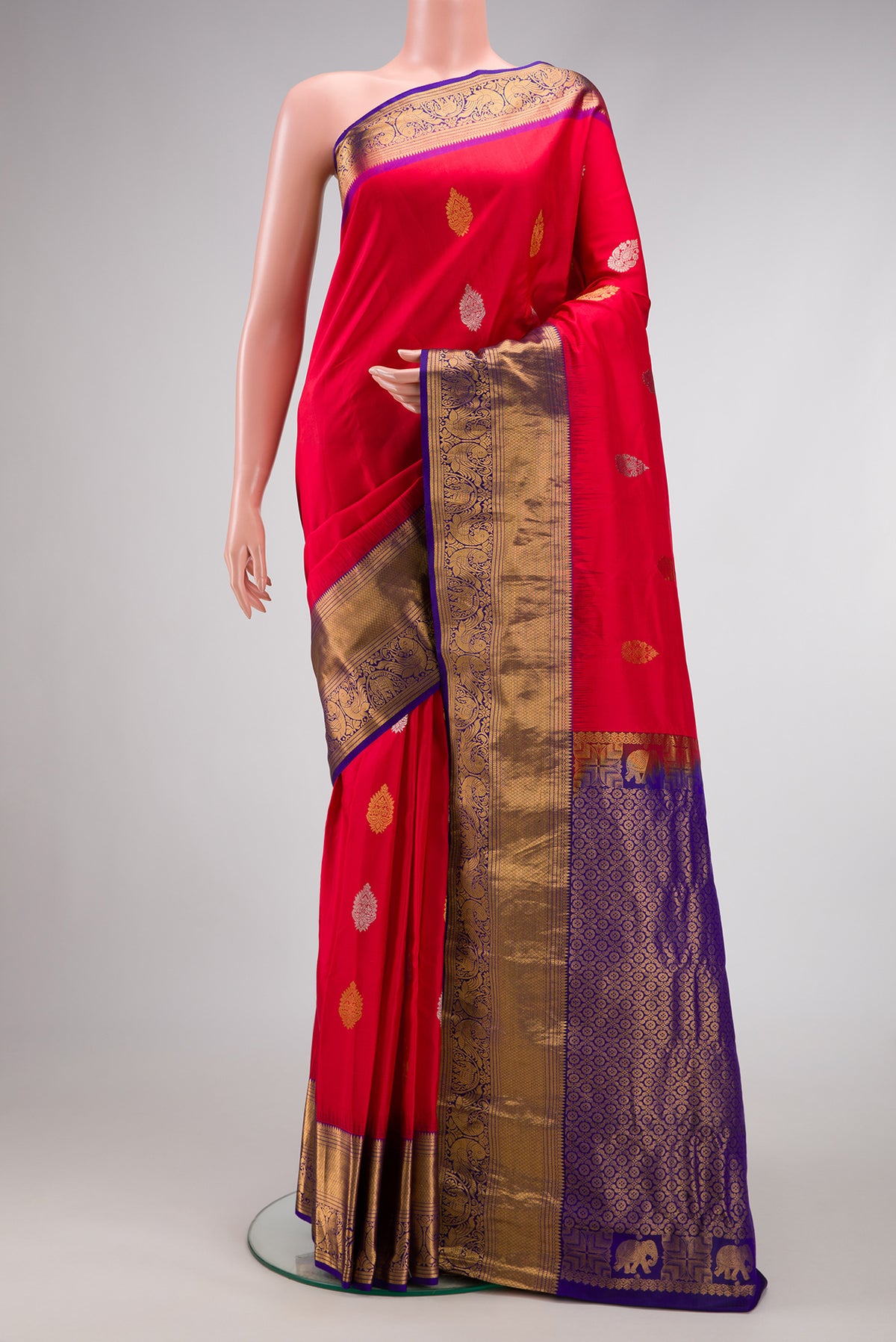 Red Dual Tone Gadwal Silk Saree with Zari Butta on the body and Zari Border.  displayed on a mannequin