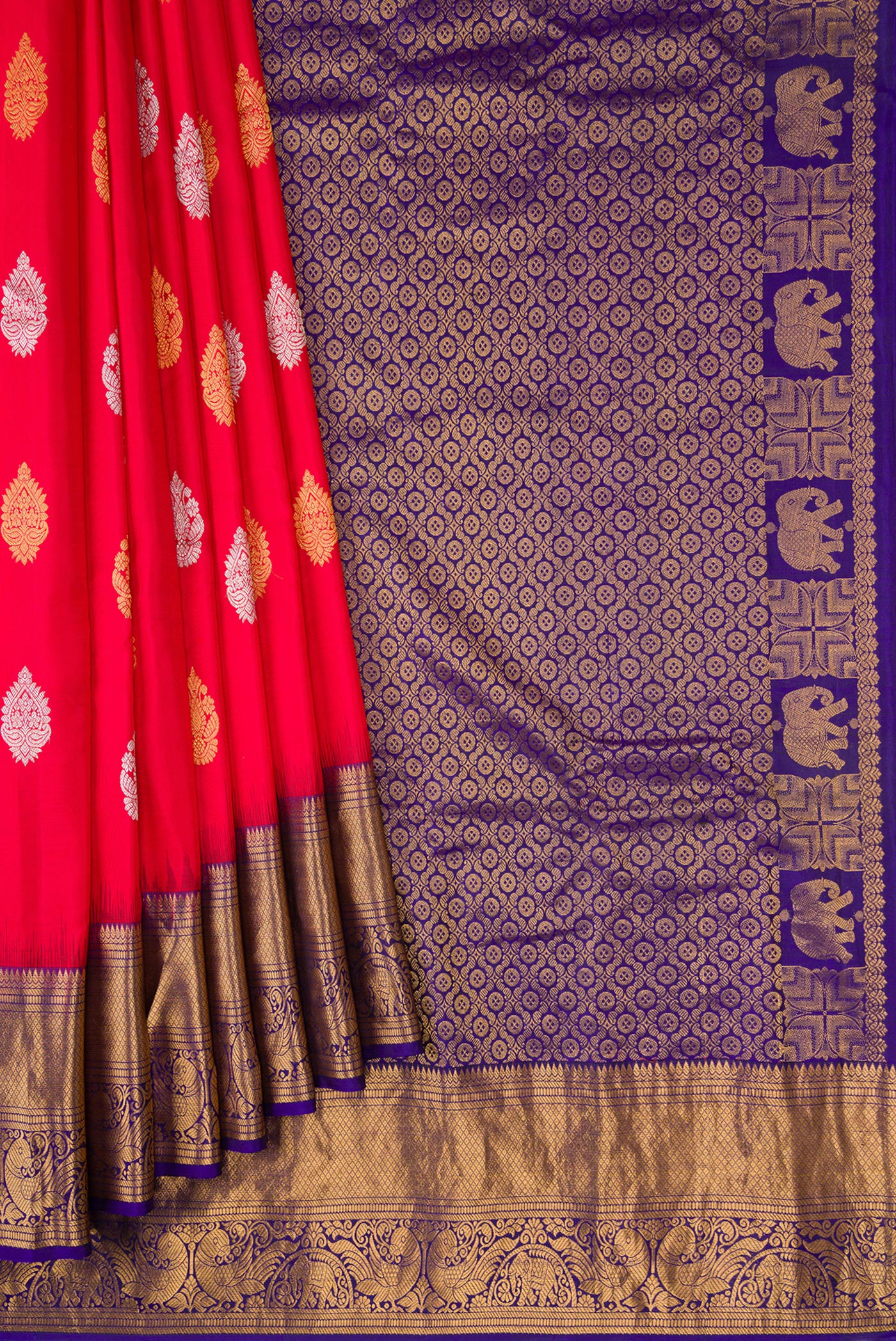 Pleats and pallu of Red Dual Tone Gadwal Silk Saree with Zari Butta on the body and Zari Border. 