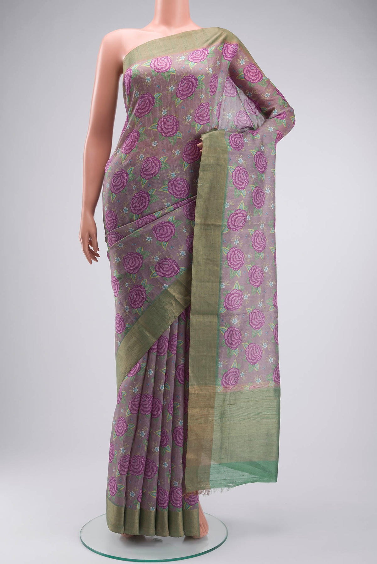 Lavender Bhagalpuri Tussar Silk Saree with Printed design on the body and Zari Border displayed on a mannequin