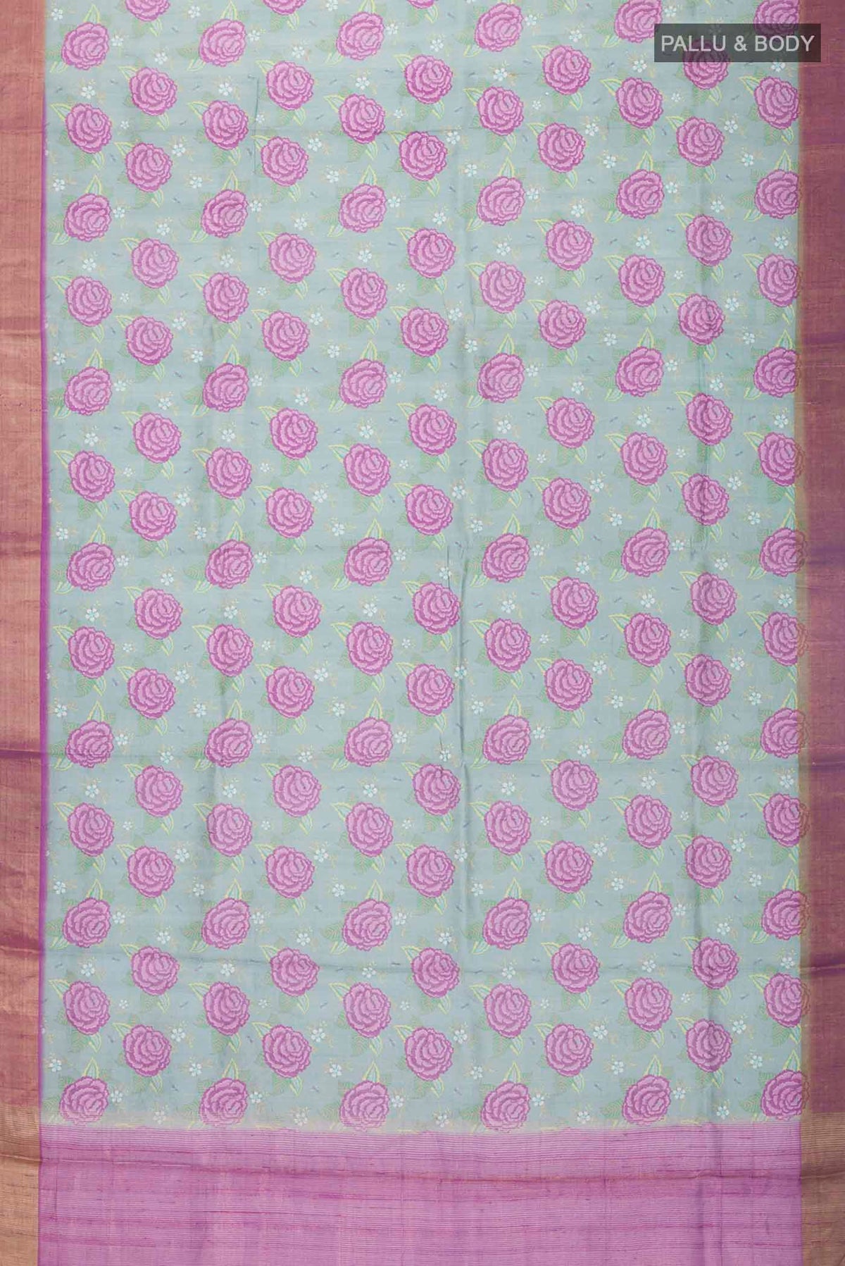Flat view of Green Tussar Silk Saree with Printed design on the body and Zari Border