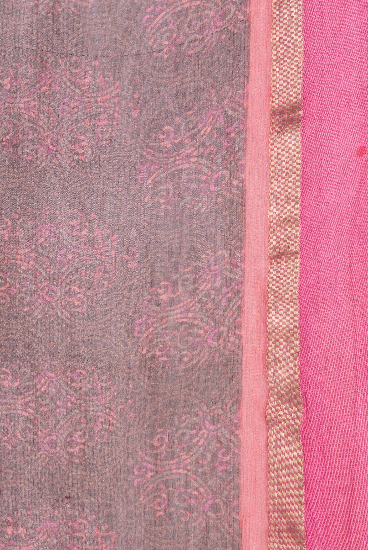 Border image of Brown Dual Tone Chiffon Saree with Printed design on the body and Zari Border. 