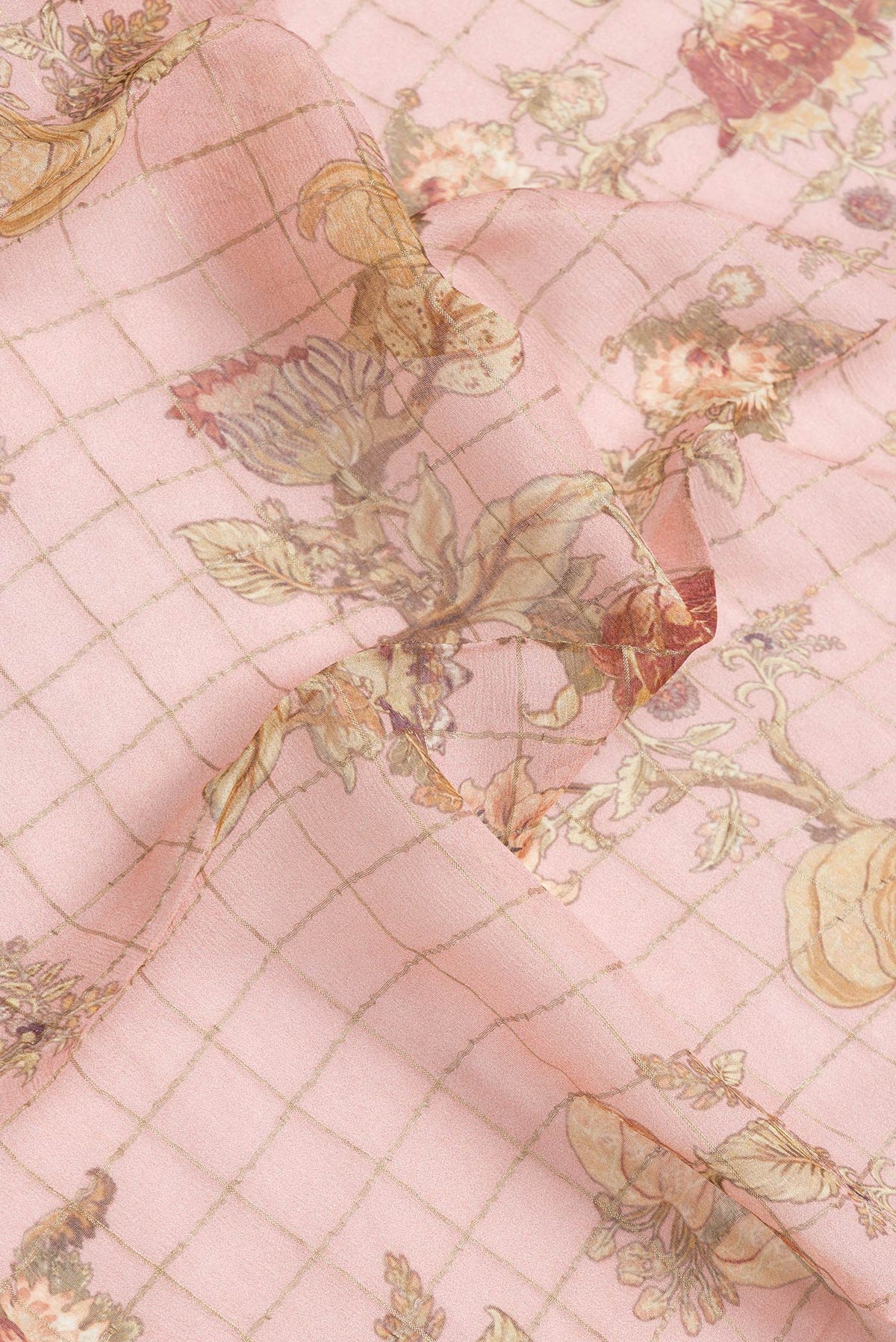 Close up of Rose Gold Dual Tone Mysore Georgette Saree with Printed design on the body and Zari And Thread Border.  displaying folds