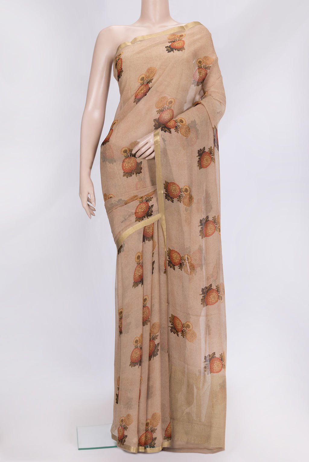 Brown Dual Tone Mysore Chiffon Saree with Printed design on the body and Zari Border.  displayed on a mannequin