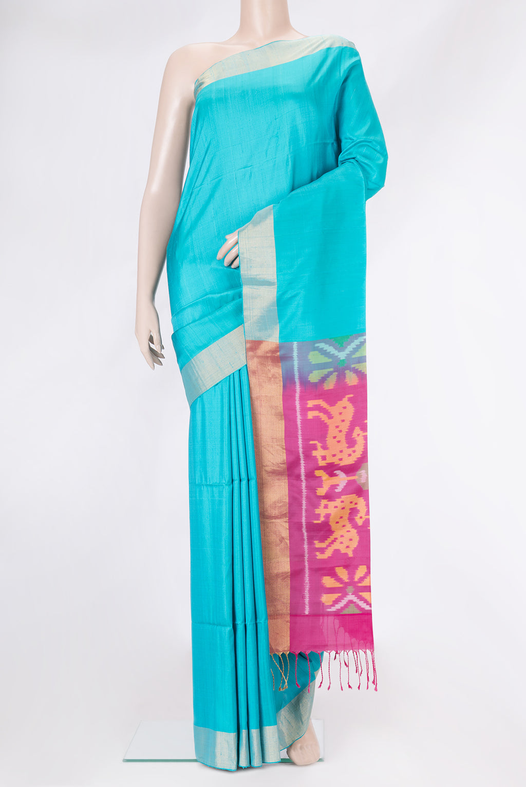 Sky Blue Soft Silk Saree with Plain Body and Zari Border.  displayed on a mannequin