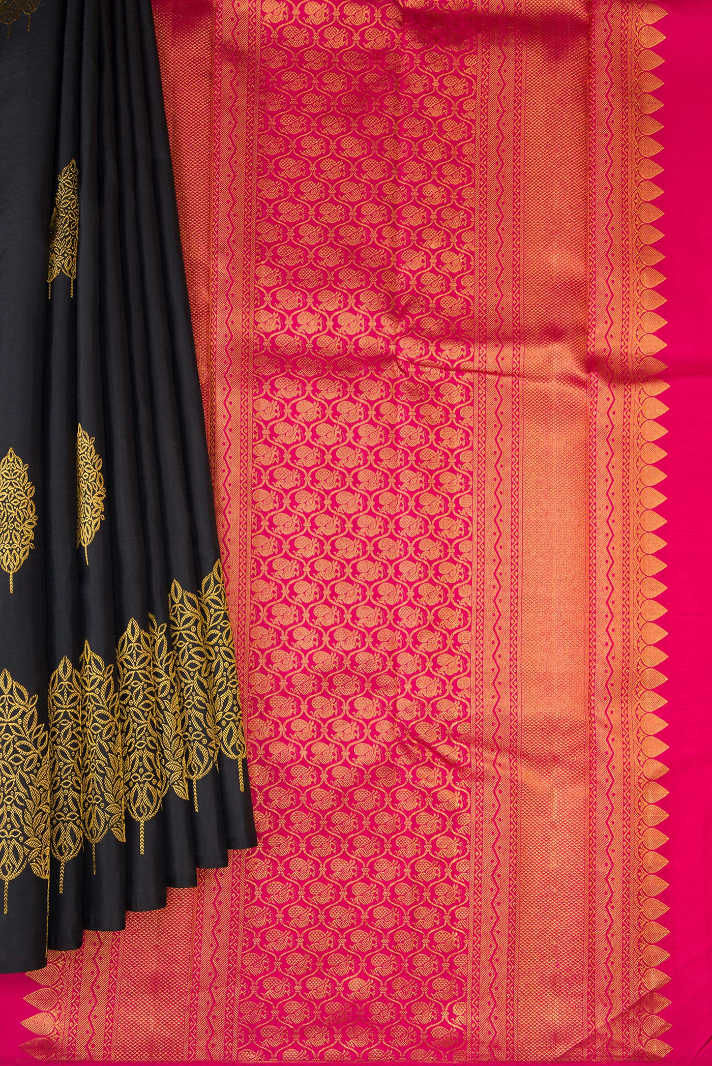 Pleats and pallu of Black Dual Tone Kanjivaram Silk Saree with Zari Butta on the body and Fancy Border. 