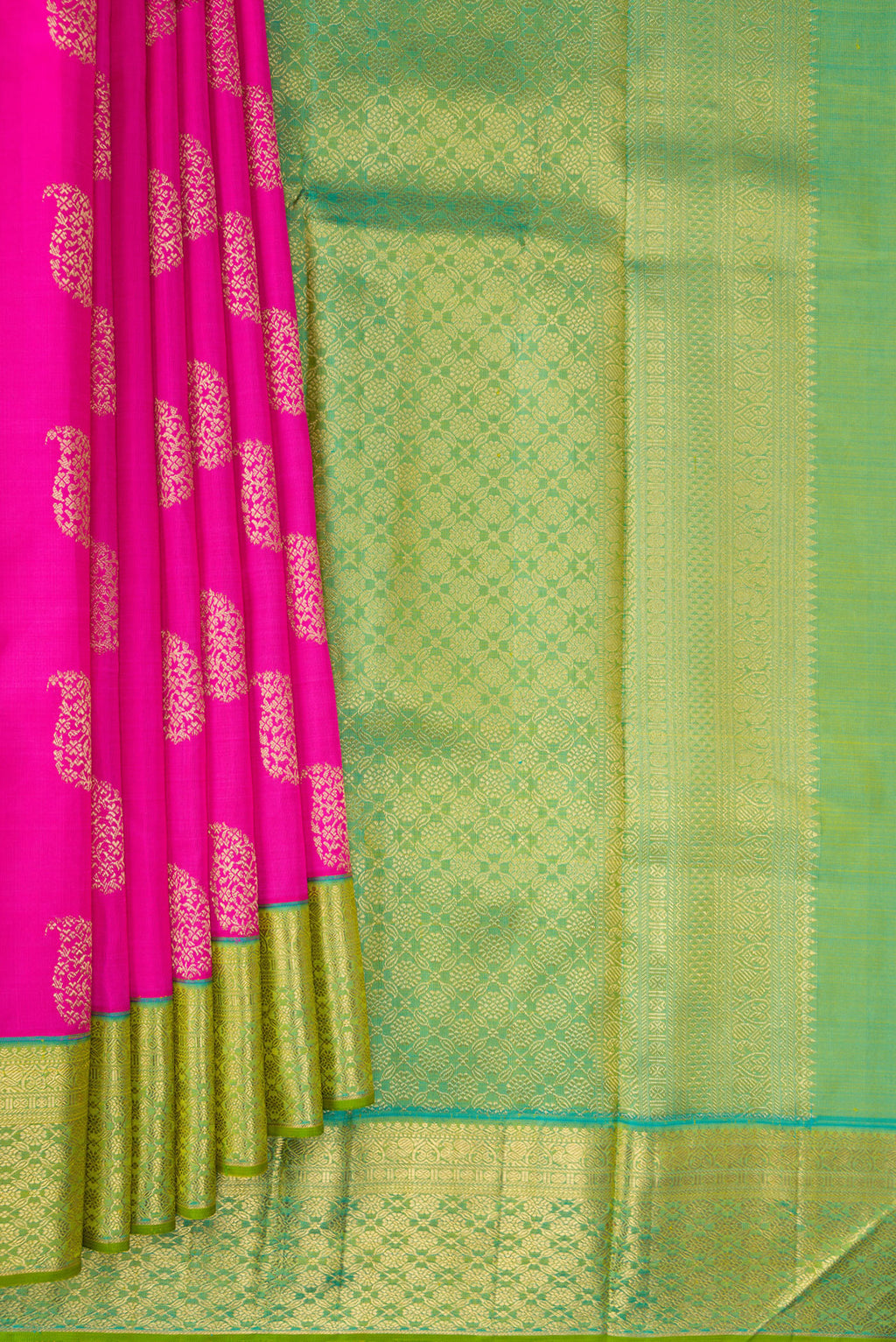 Pleats and pallu of Pure Silk Pure Zari Pink Kanjivaram Saree with Zari Butta on the body and Zari Border. 
