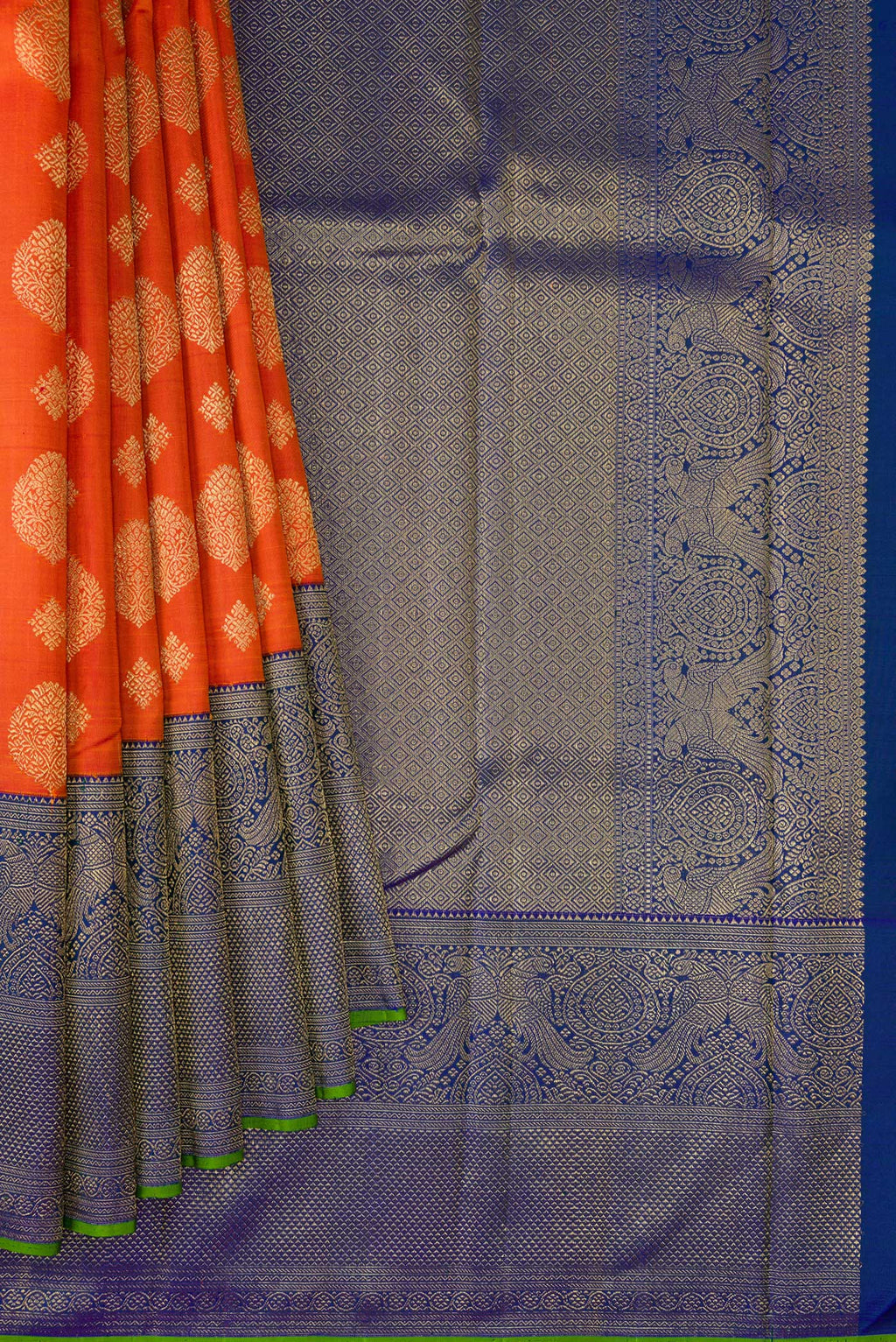 Pleats and pallu of Pure Silk Pure Zari Orange Kanjivaram Saree with Zari Butta on the body and Fancy Border. 