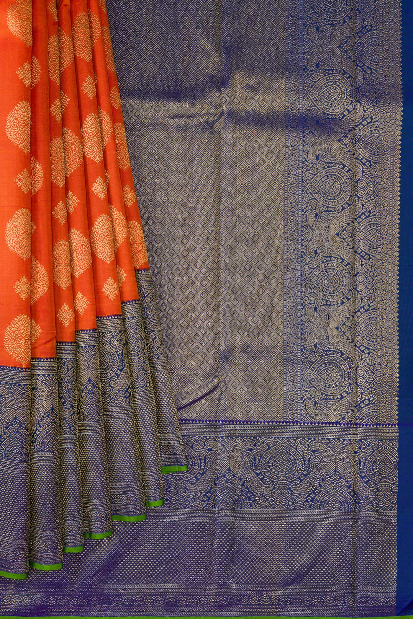 Pleats and pallu of Pure Silk Pure Zari Orange Kanjivaram Saree with Zari Butta on the body and Fancy Border. 