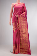 Pure Silk Pure Zari Magenta Dual Tone Kanjivaram Saree with Zari Brocade on the body and Zari Border.  displayed on a mannequin