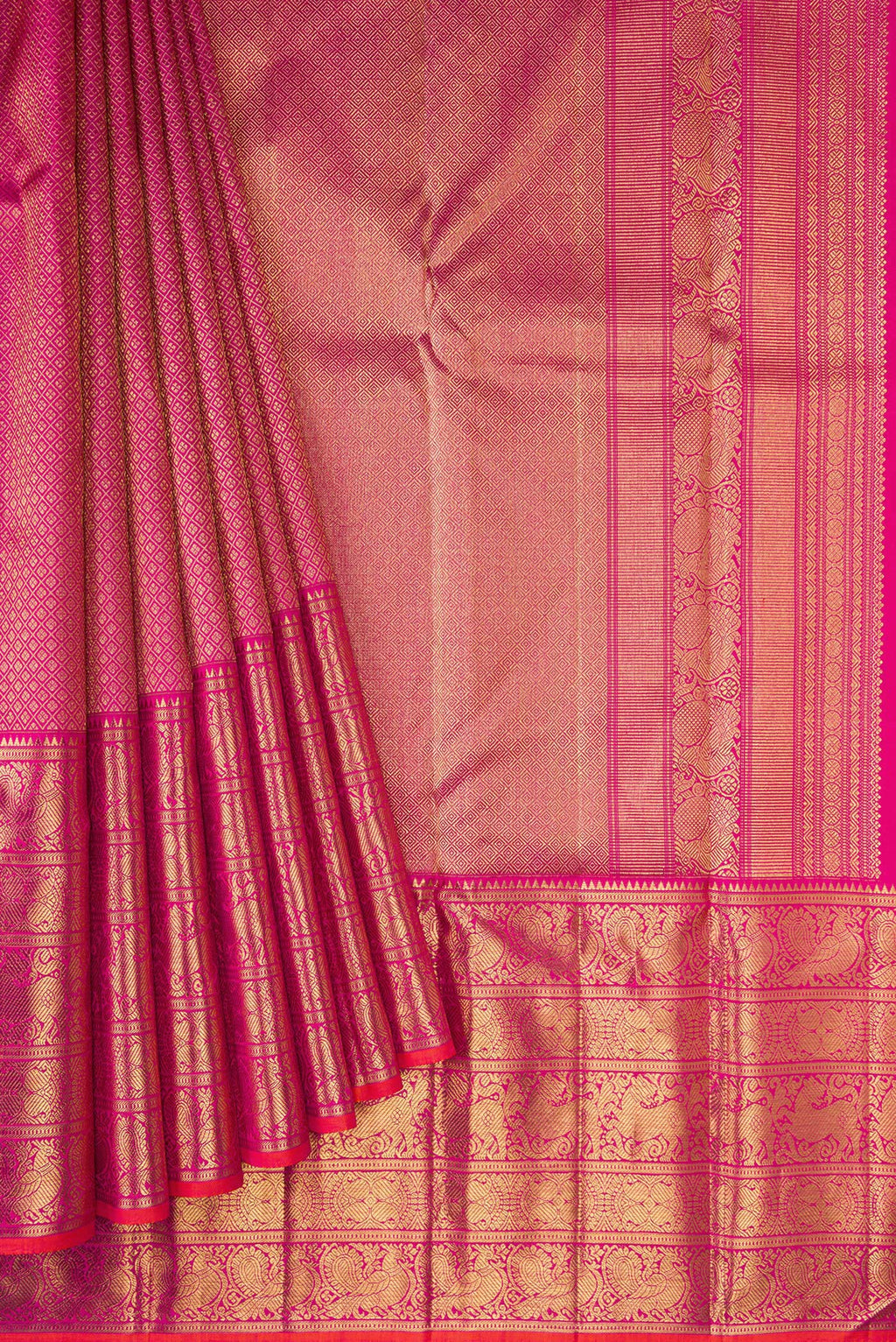 Pleats and pallu of Pure Silk Pure Zari Magenta Dual Tone Kanjivaram Saree with Zari Brocade on the body and Zari Border. 