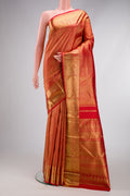 Pure Silk Pure Zari Red Dual Tone Kanjivaram Saree with Zari Brocade on the body and Zari Border.  displayed on a mannequin