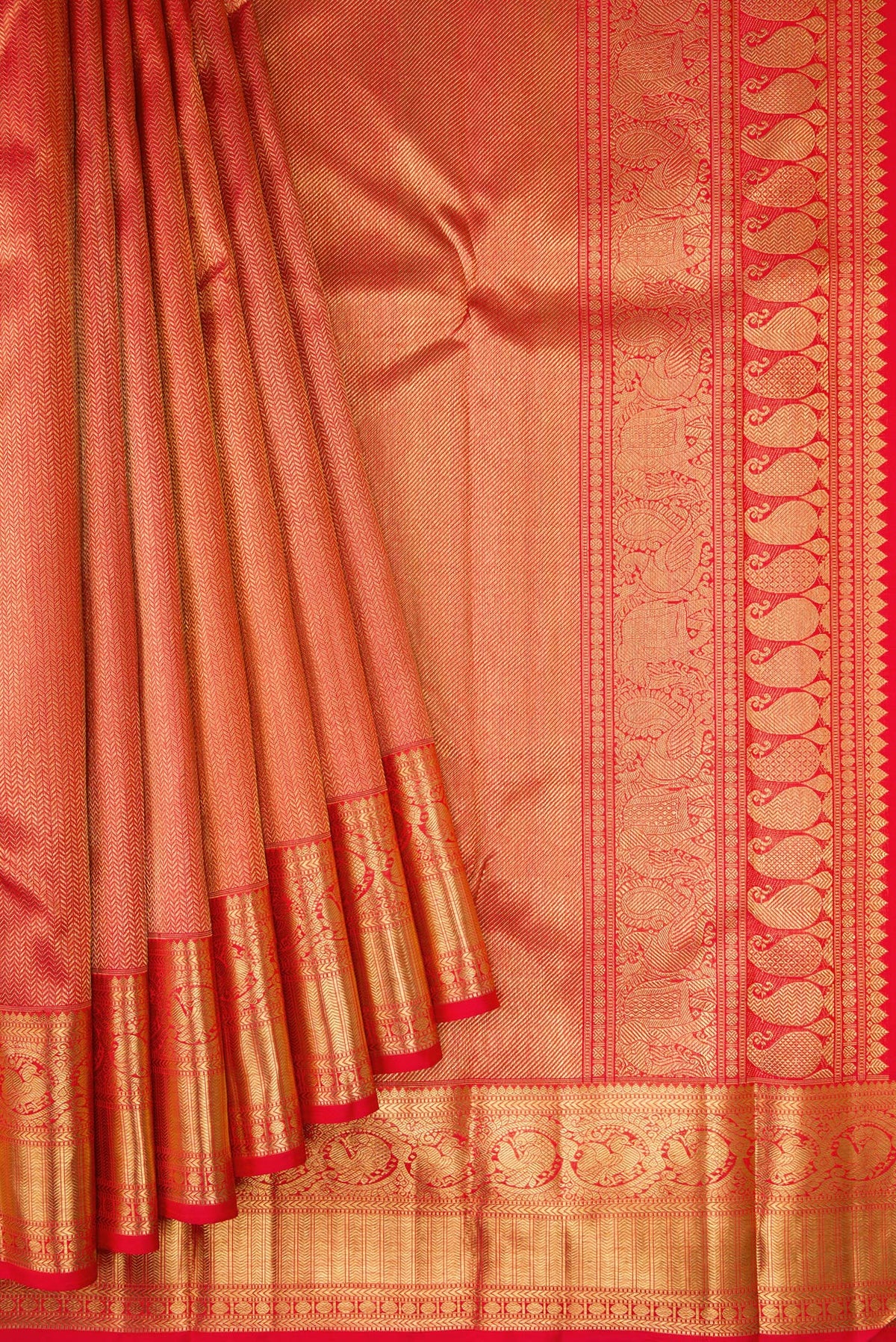 Pleats and pallu of Pure Silk Pure Zari Red Dual Tone Kanjivaram Saree with Zari Brocade on the body and Zari Border. 