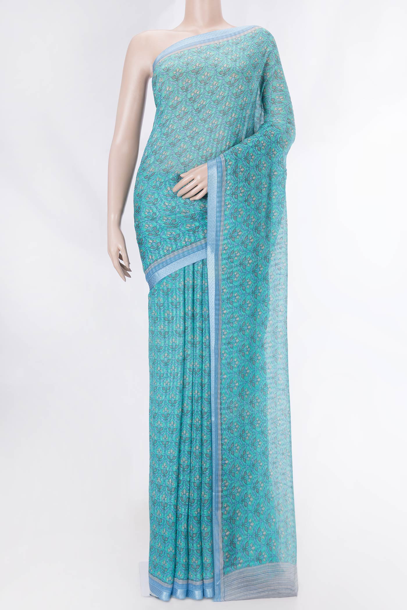 Blue Mysore Chiffon Saree with Printed design on the body and Printed Border displayed on a mannequin