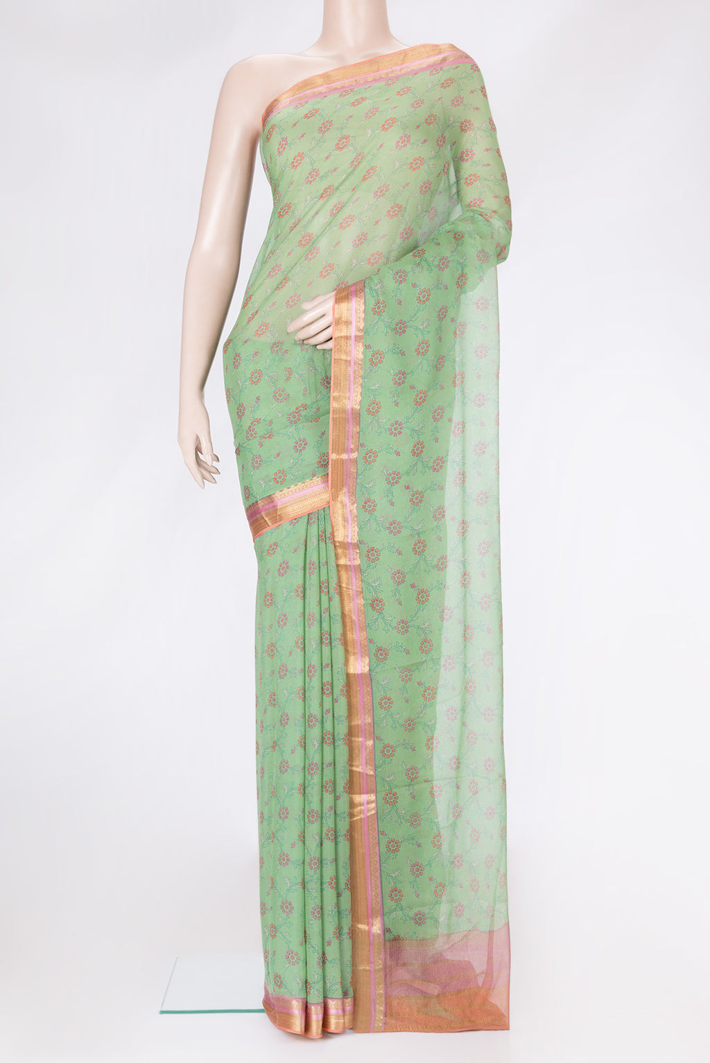 Green Dual Tone Mysore Chiffon Saree with Printed design on the body and Zari Border.  displayed on a mannequin