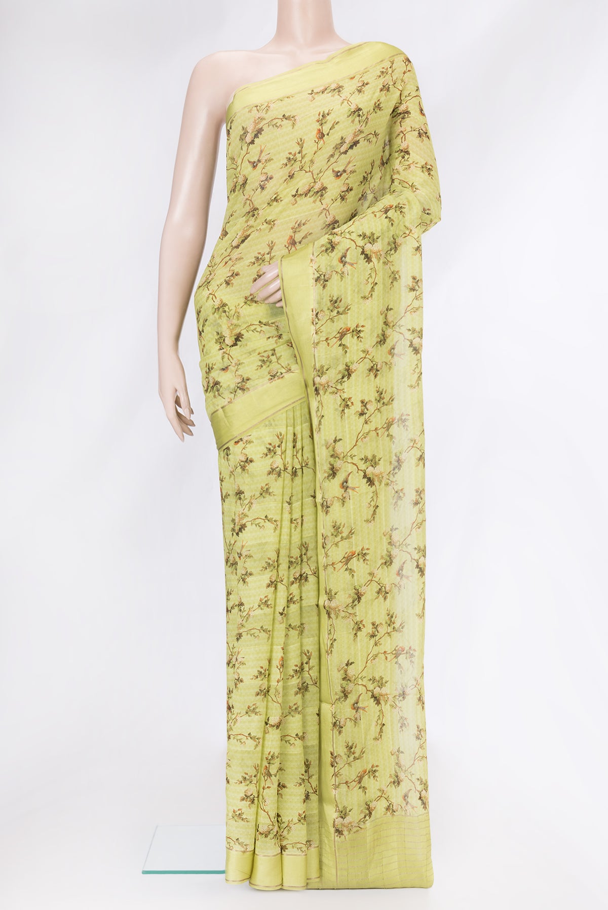 Mehandi Green Dual Tone Mysore Georgette Saree with Printed design on the body and Zari Border.  displayed on a mannequin