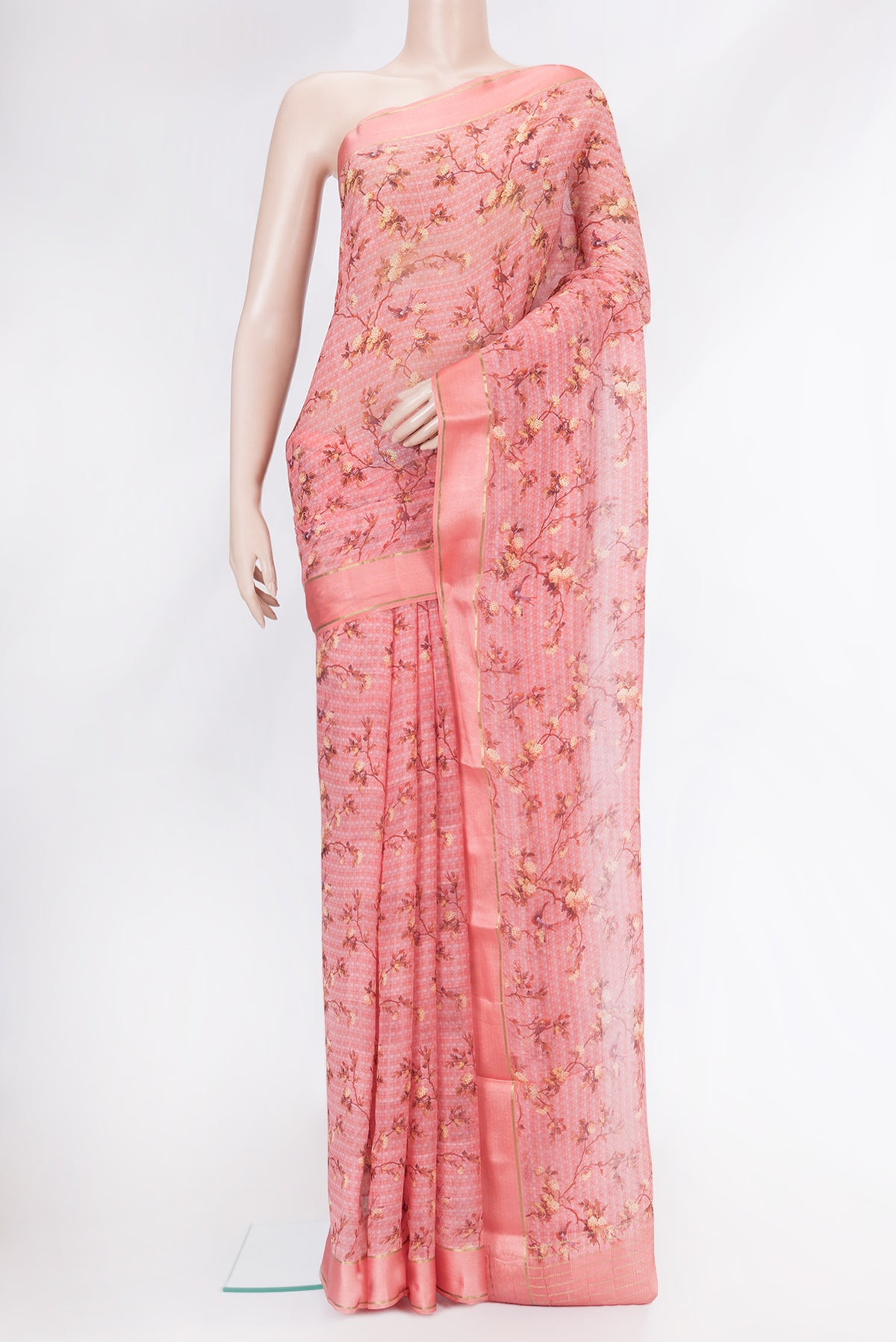 Golden Peach Dual Tone Mysore Georgette Saree with Printed design on the body and Zari Border.  displayed on a mannequin