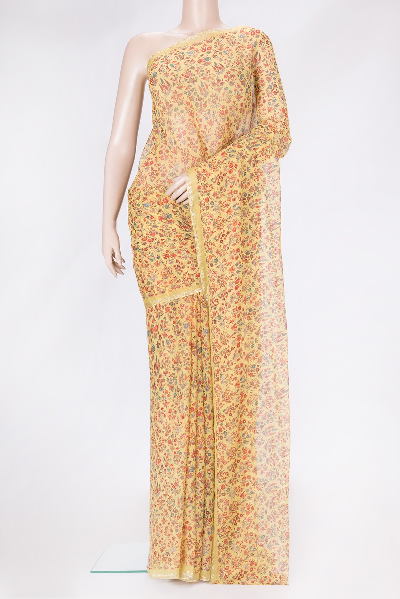 Yellow Dual Tone Mysore Chiffon Saree with Printed design on the body and Zari Border.  displayed on a mannequin