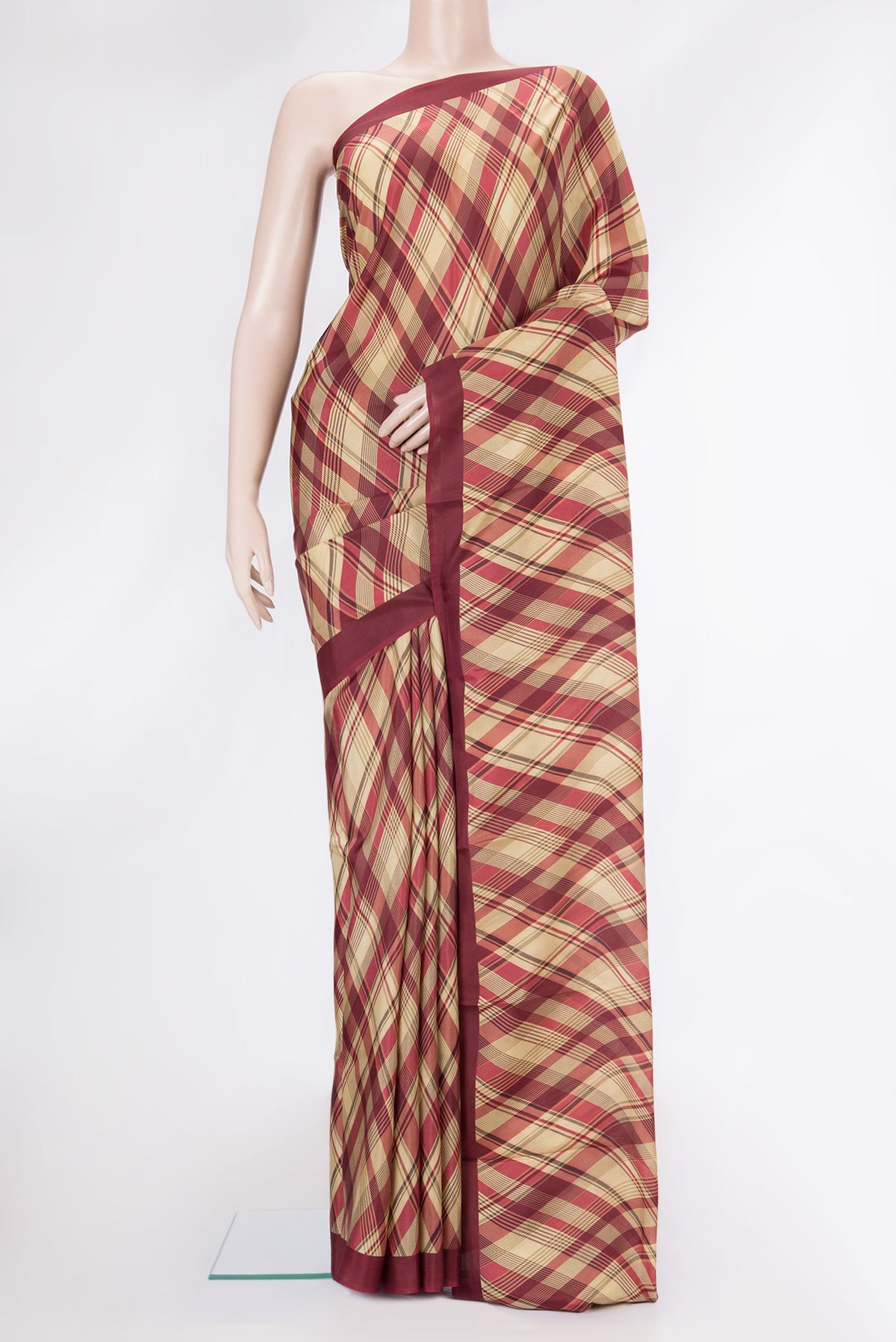 Beige Dual Tone Printed Silk Saree with Printed design on the body and Plain Border.  displayed on a mannequin