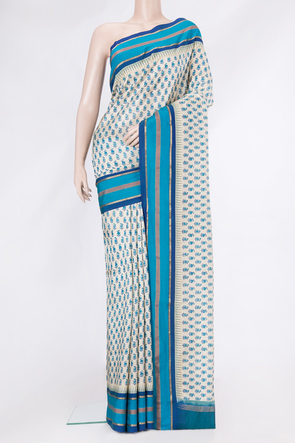 Beige Dual Tone Kanjivaram Silk Saree with Printed design on the body and Zari Border.  displayed on a mannequin