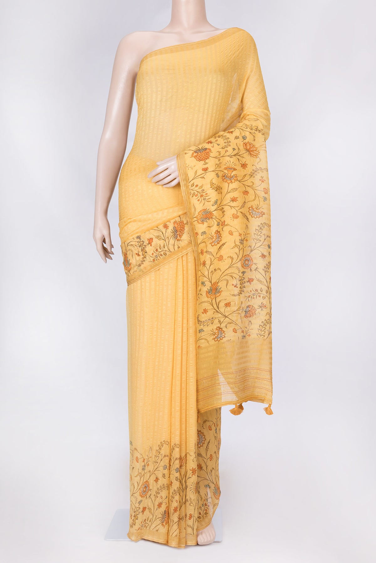 Yellow Dual Tone Mysore Chiffon Saree with Printed design on the body and Zari Border displayed on a mannequin