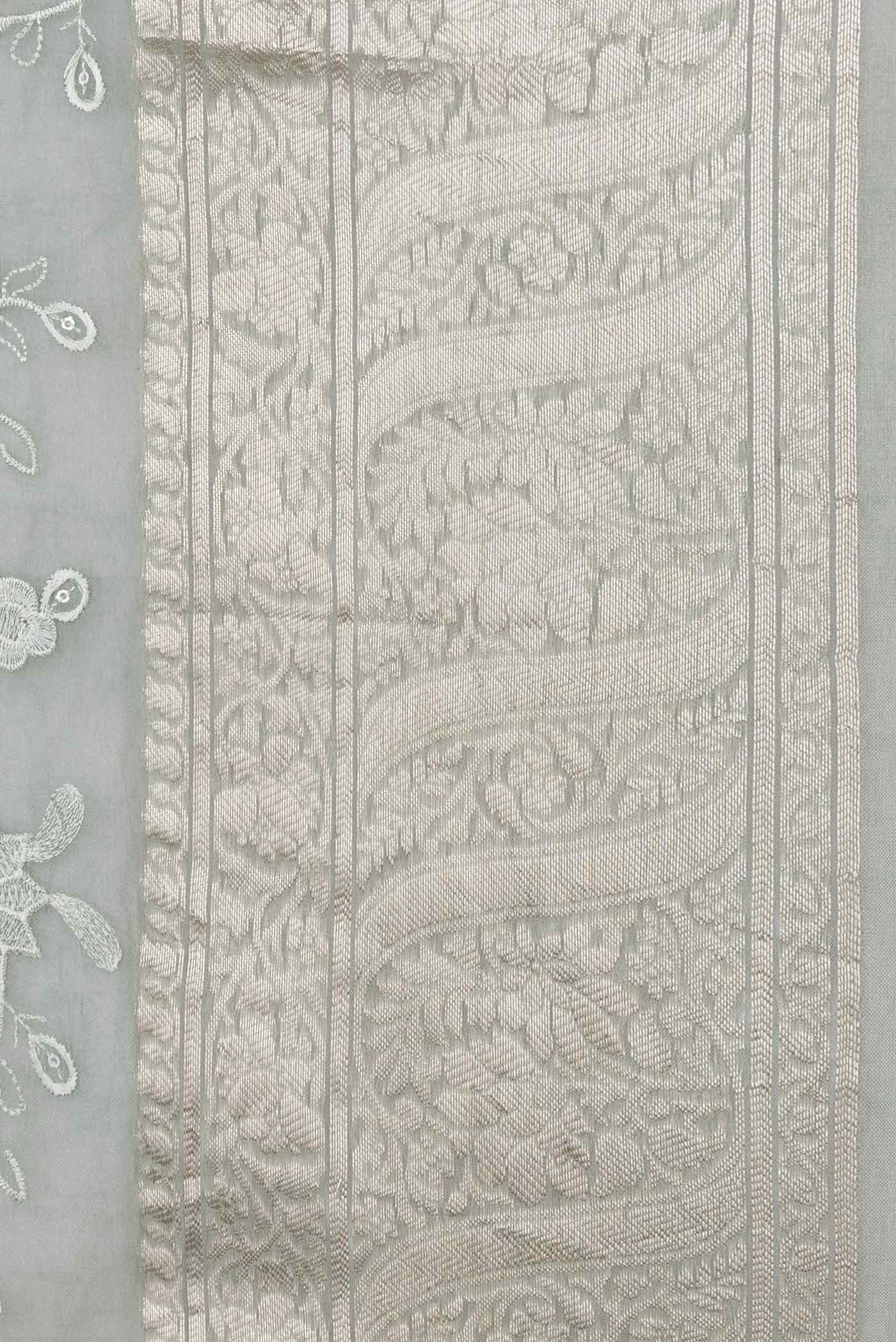 Border image of Light Green Dual Tone Organza Silk Saree with Zari Brocade on the body and Zari Border. 