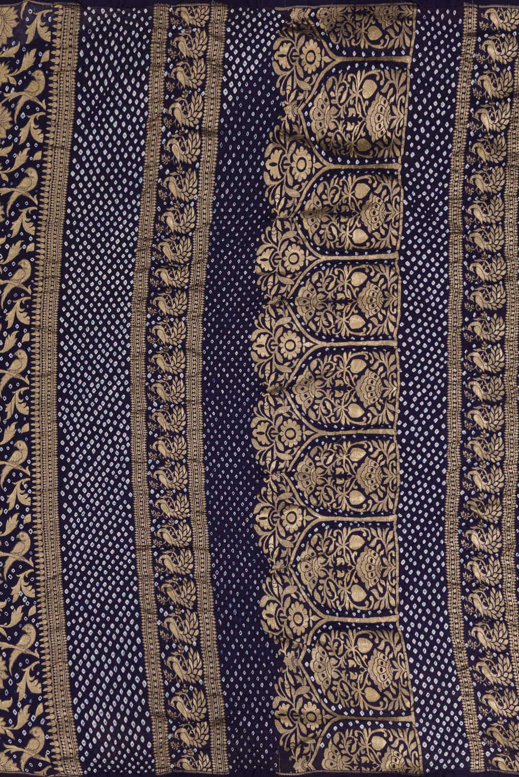 Close up image of the pallu of Navy Blue Dual Tone Bandhani Silk Saree with Bandhani Print on the body and Without Border. 
