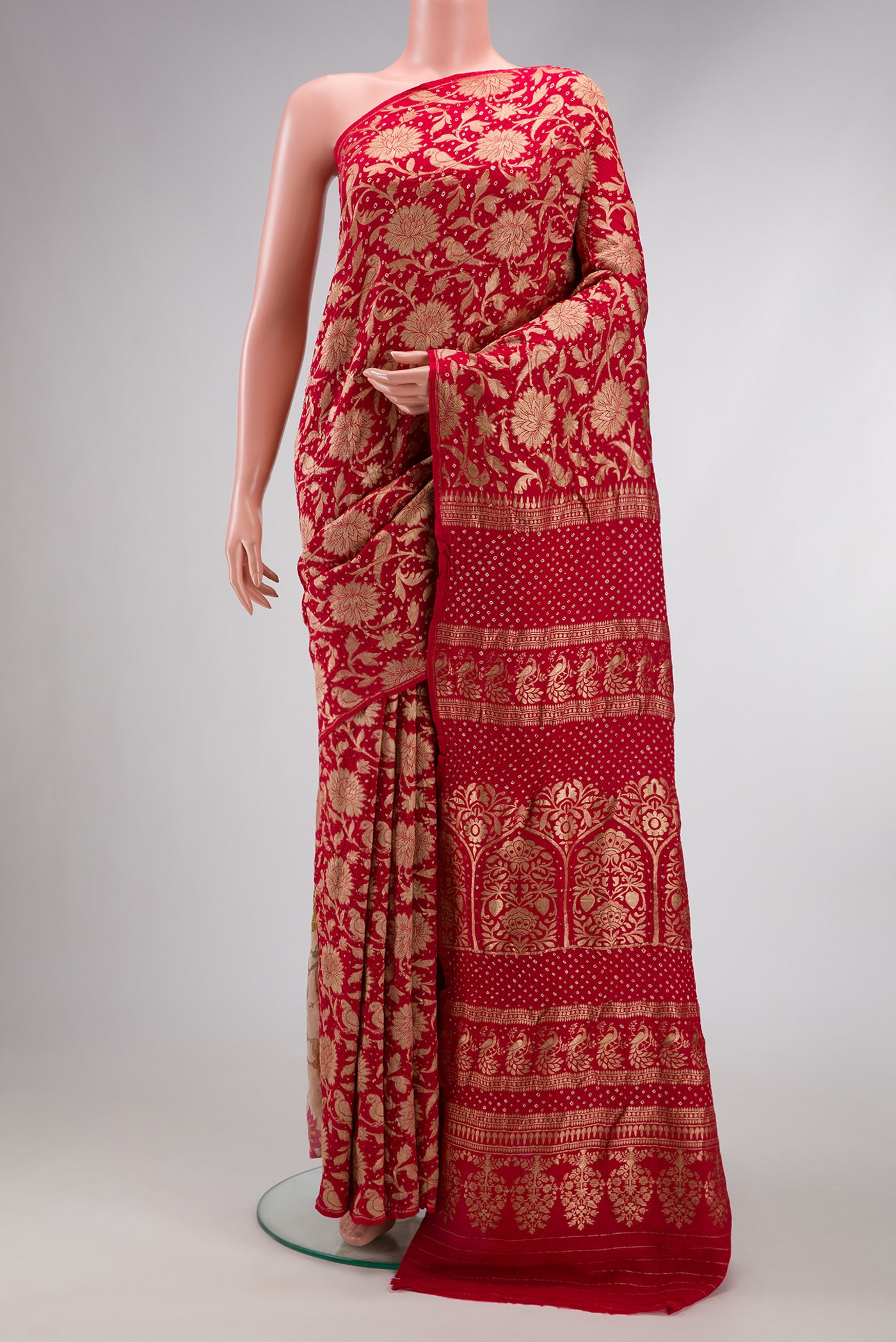 Red Dual Tone Bandhani Silk Saree with Bandhani Print on the body and Without Border.  displayed on a mannequin