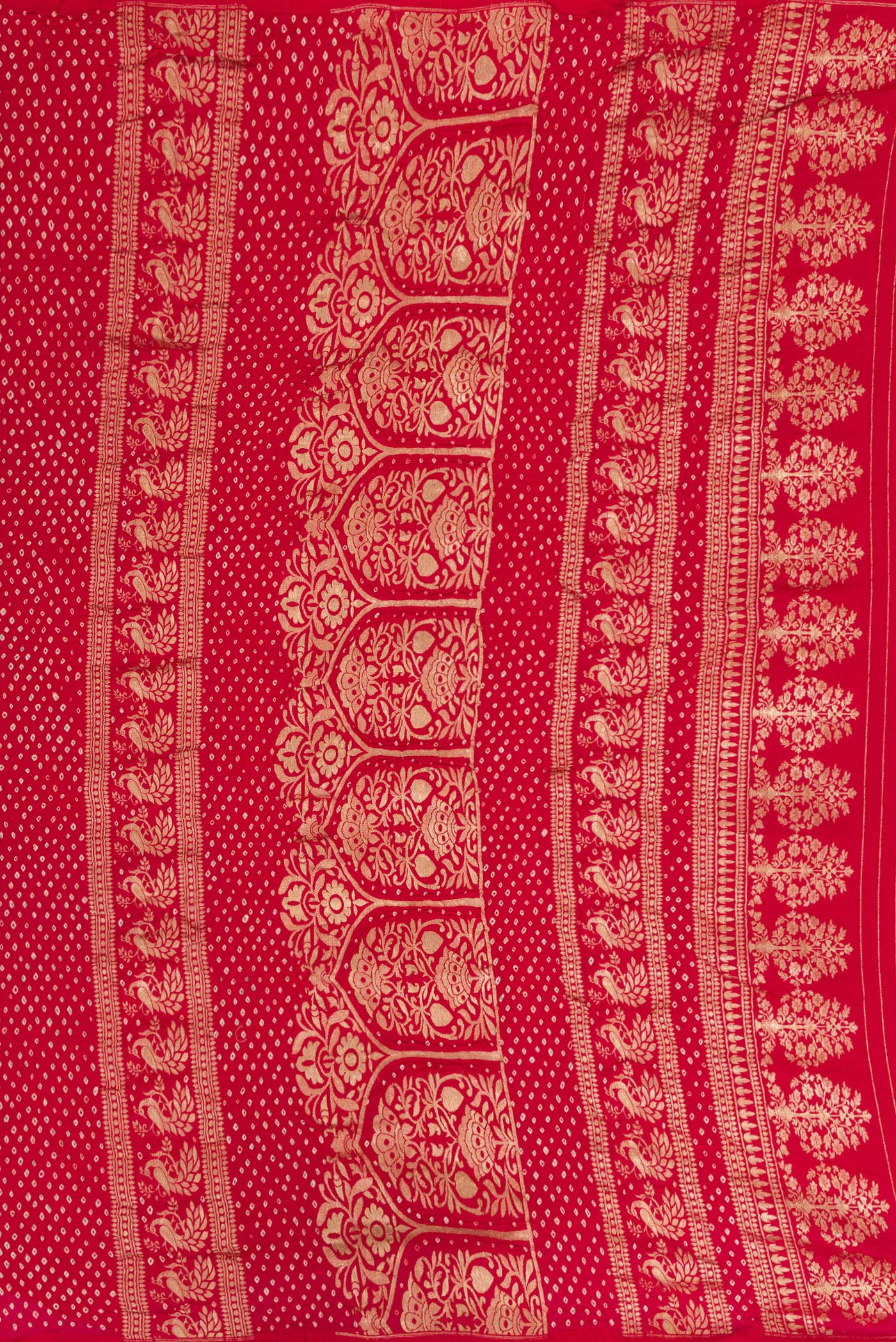 Close up image of the pallu of Red Dual Tone Bandhani Silk Saree with Bandhani Print on the body and Without Border. 