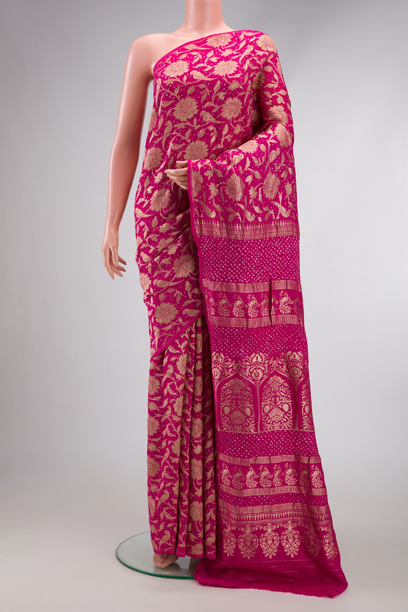 Dark Pink Dual Tone Bandhani Silk Saree with Bandhani Print on the body and Without Border.  displayed on a mannequin