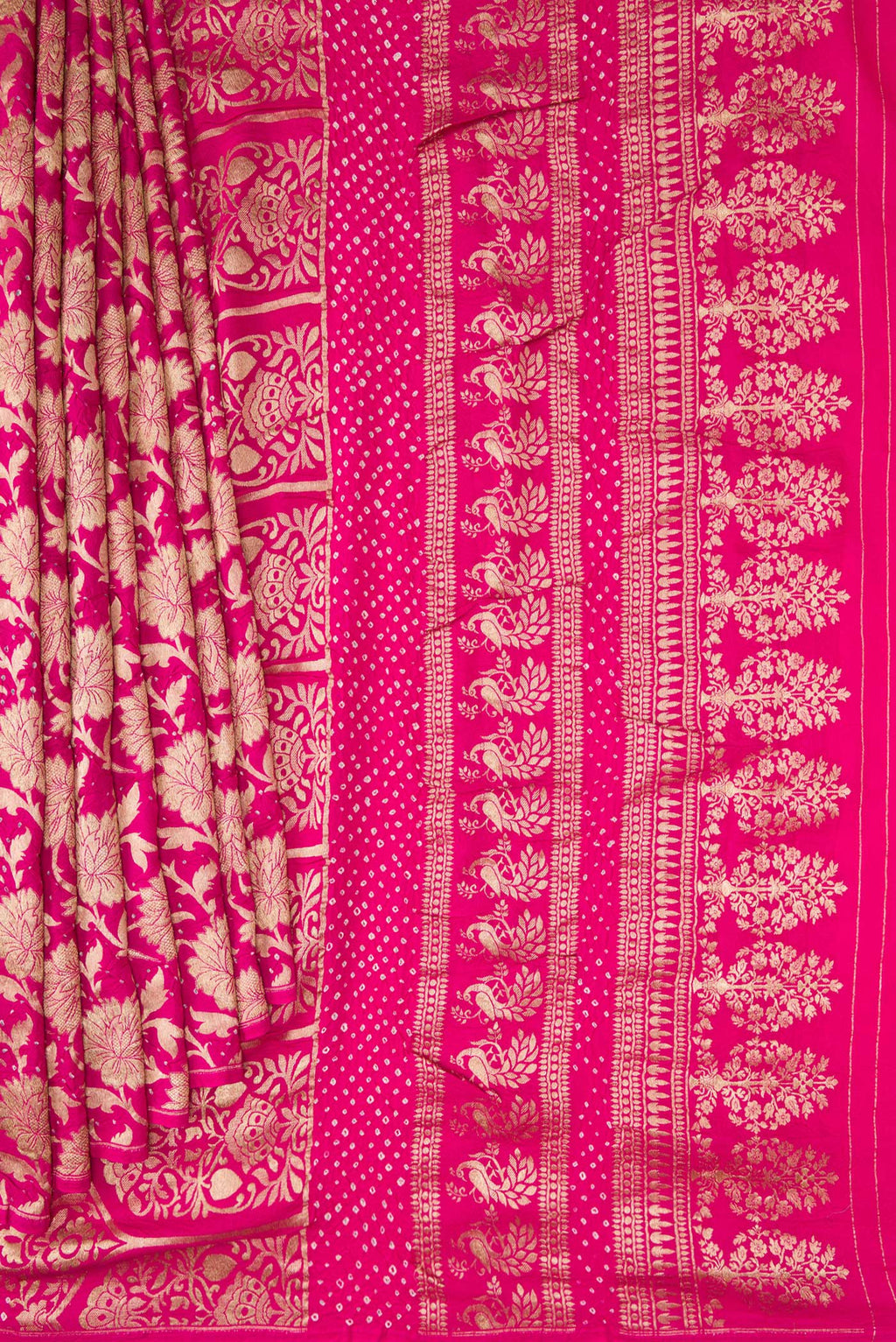 Pleats and pallu of Dark Pink Dual Tone Bandhani Silk Saree with Bandhani Print on the body and Without Border. 