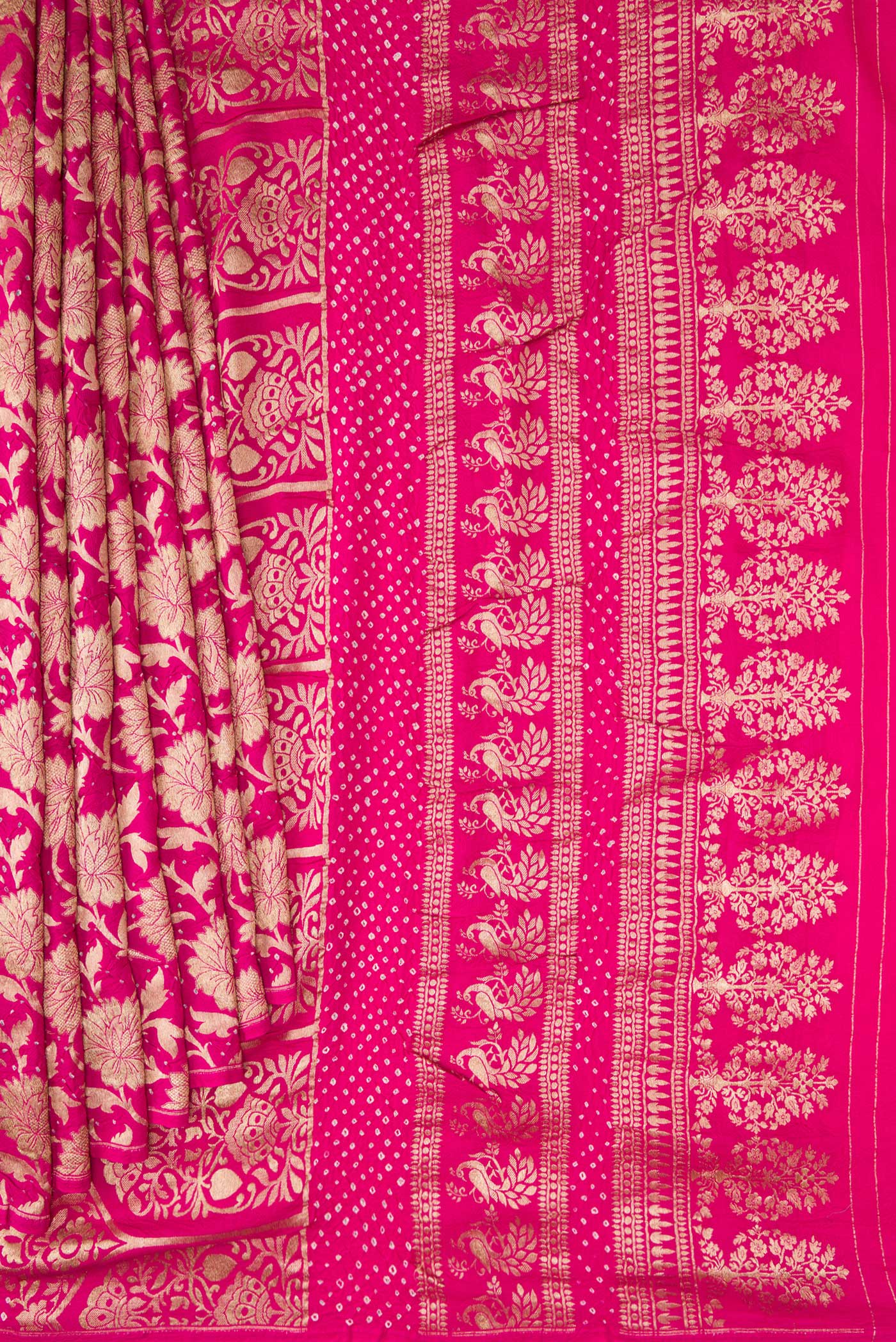 Pleats and pallu of Dark Pink Dual Tone Bandhani Silk Saree with Bandhani Print on the body and Without Border. 
