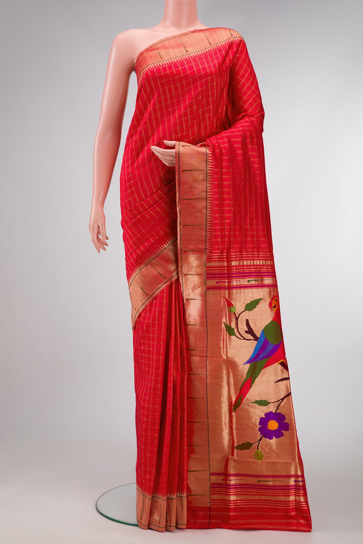 Red Dual Tone Paithani Silk Saree with Checked design on the body and Paithani Border.  displayed on a mannequin