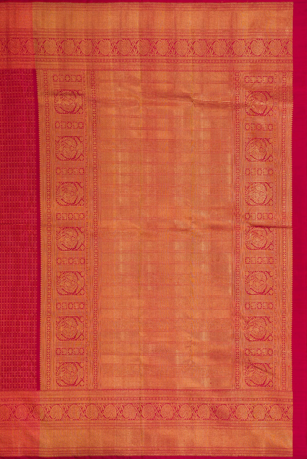 Close up image of the pallu of Maroon Dual Tone Kanchipuram Silk Saree with Zari Brocade on the body and Zari Border. 