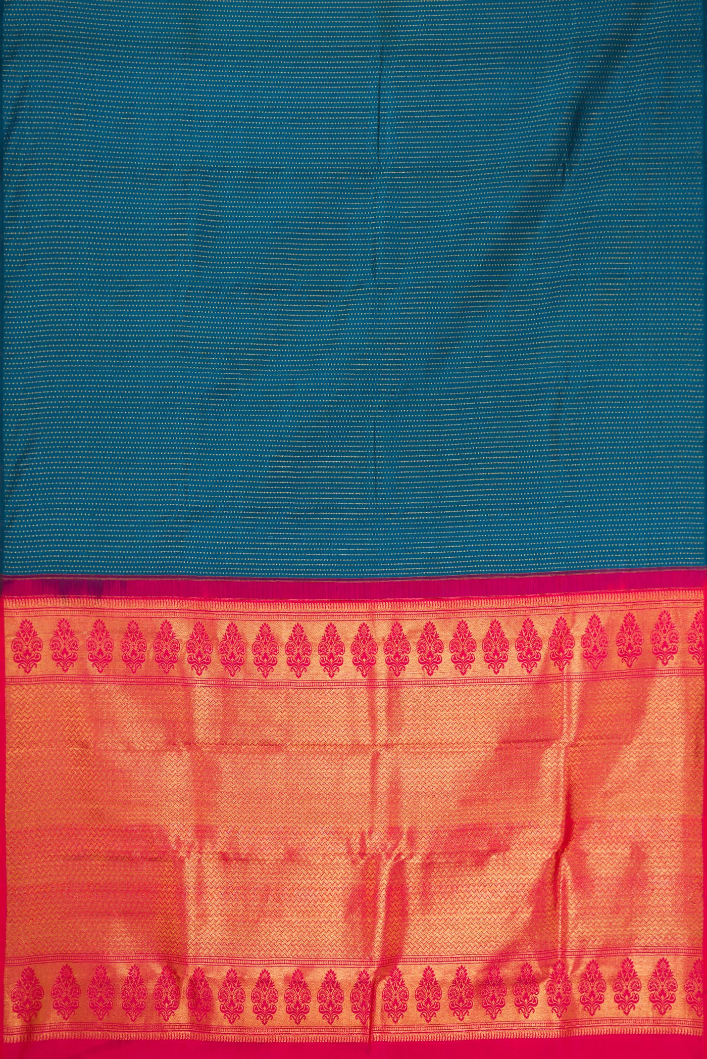 Flat view of Peacock Blue Kanjivaram Silk Saree with Zari Butta on the body and Without Border. 