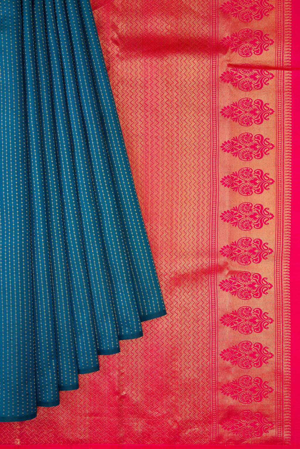 Pleats and pallu of Peacock Blue Kanjivaram Silk Saree with Zari Butta on the body and Without Border. 