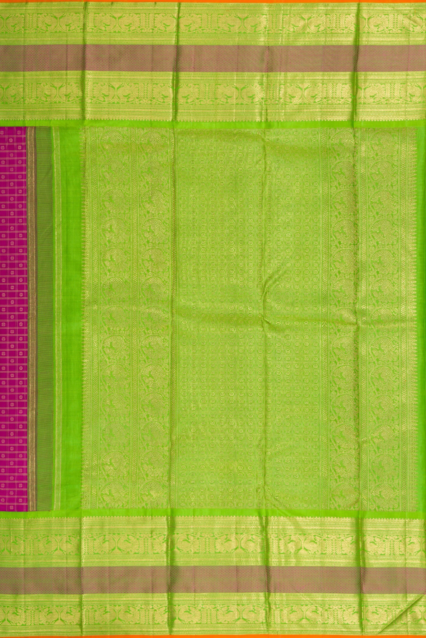 Close up image of the pallu of Pure Silk Pure Zari Magenta Dual Tone Kanjivaram Saree with Zari Brocade on the body and Zari Border. 