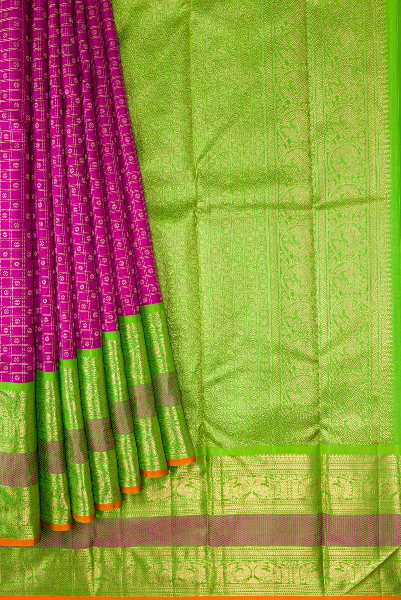 Pleats and pallu of Pure Silk Pure Zari Magenta Dual Tone Kanjivaram Saree with Zari Brocade on the body and Zari Border. 
