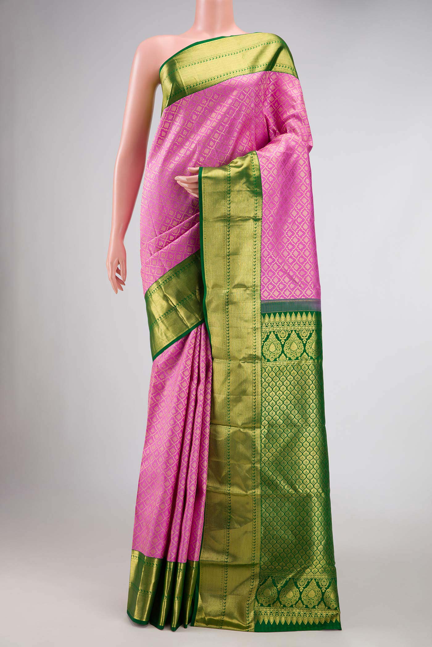 Pink Dual Tone Kanchipuram Silk Saree with Zari Brocade on the body and Zari Border displayed on a mannequin