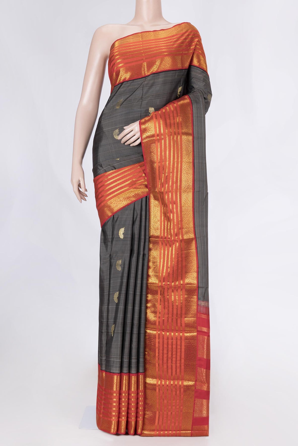Black Dual Tone Kanchipuram Saree with Stripes on the body and Zari Border displayed on a mannequin