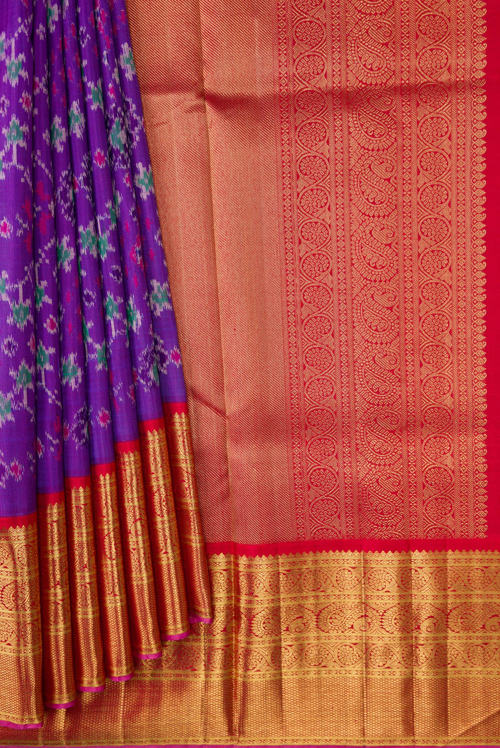 Pleats and pallu of Purple Dual Tone Kanjivaram Silk Saree with Ikat Print on the body and Zari Border. 