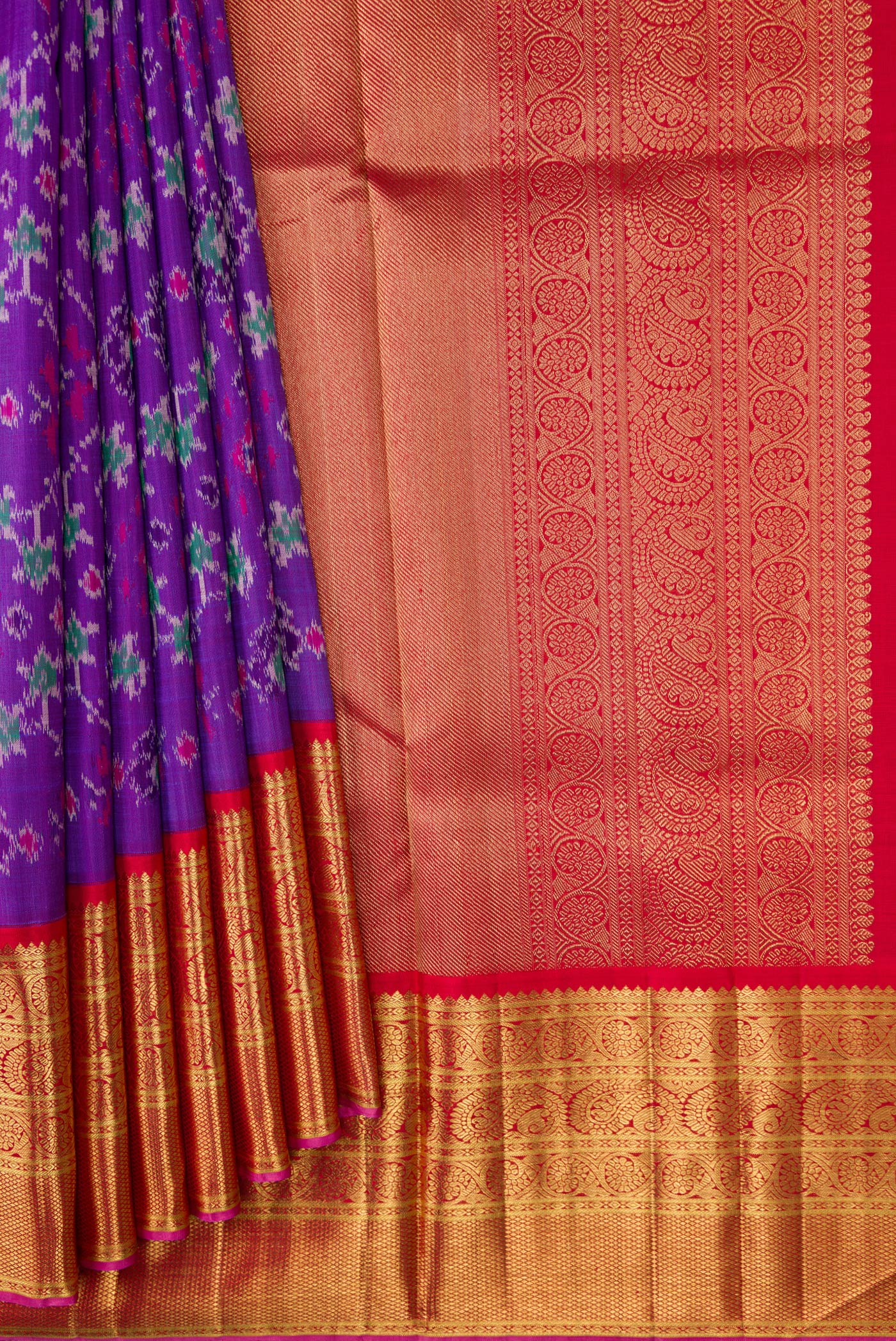 Pleats and pallu of Purple Dual Tone Kanjivaram Silk Saree with Ikat Print on the body and Zari Border. 