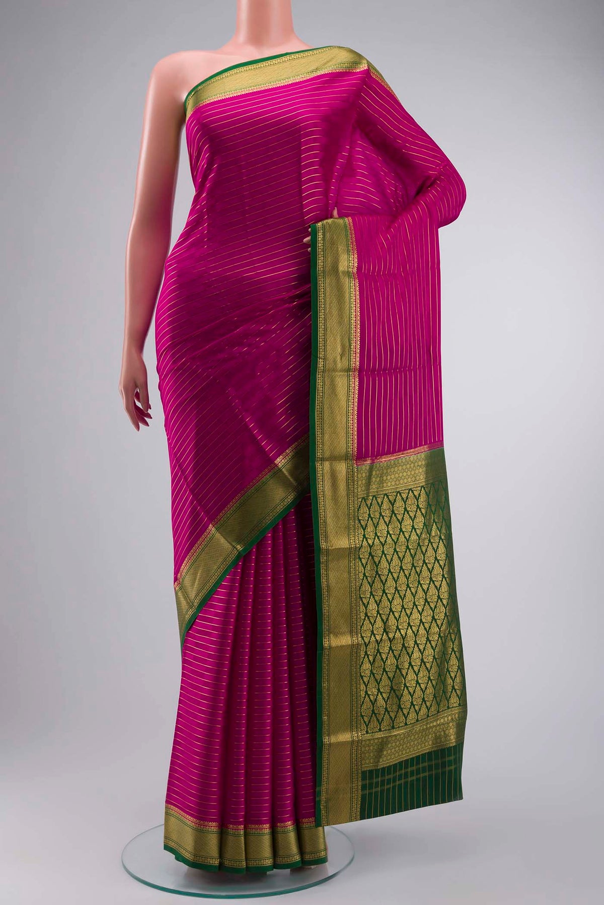 Pink Mysore Crepe Saree with Stripes on the body and Zari Border displayed on a mannequin