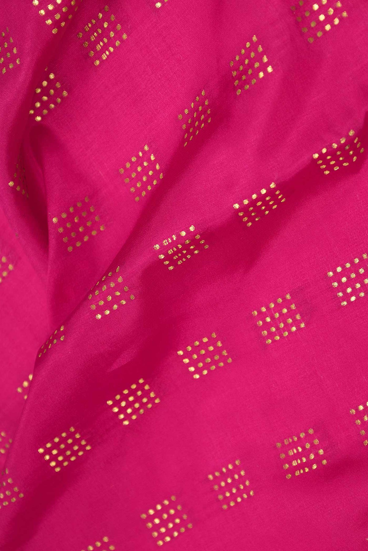 Close up of Pink Dual Tone Mysore Crepe Saree with Zari Butta on the body and Zari Border displaying folds